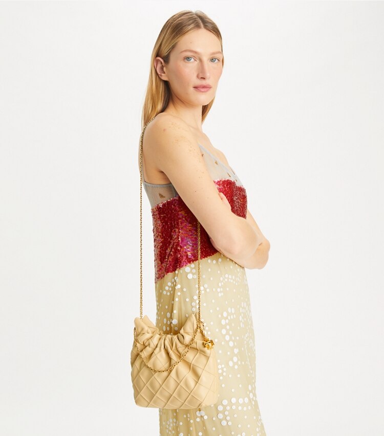 Tory Burch designer crossbody bags Mini Fleming Soft Hobo Bag in Vanilla Soft Serve accessory on model