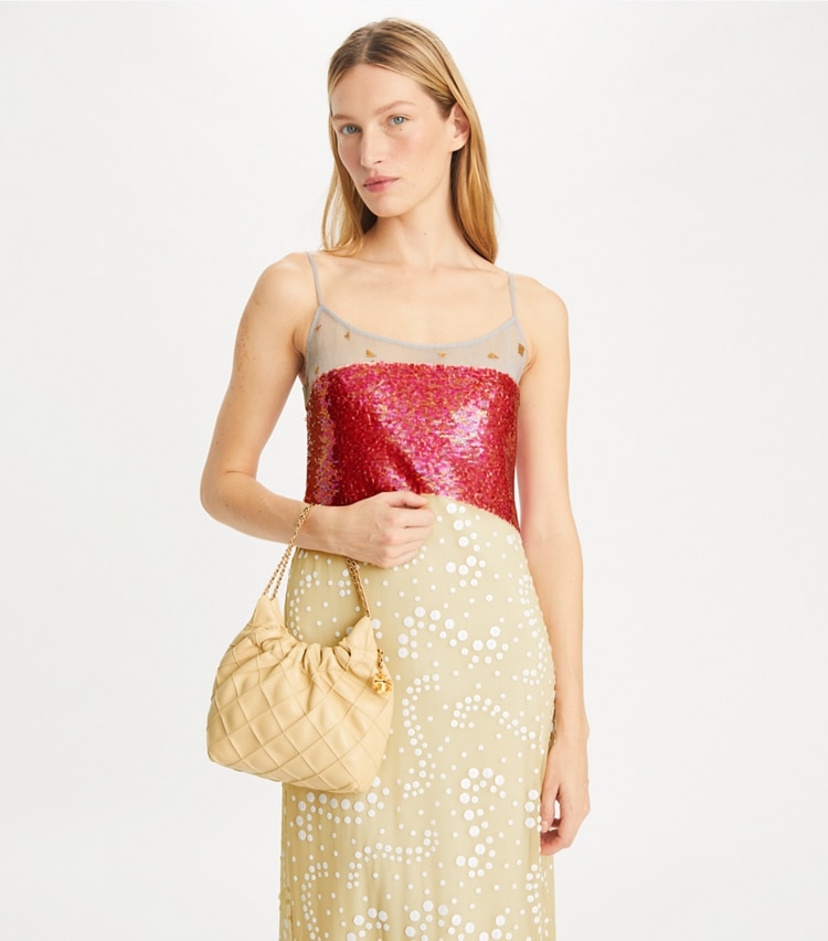 Tory Burch designer crossbody bags Mini Fleming Soft Hobo Bag in Vanilla Soft Serve additional on model