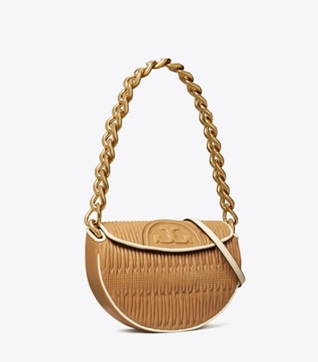 Tory Burch designer shoulder bags Mini Fleming Soft Pleated Crescent Bag in DUSTY ALMOND angle