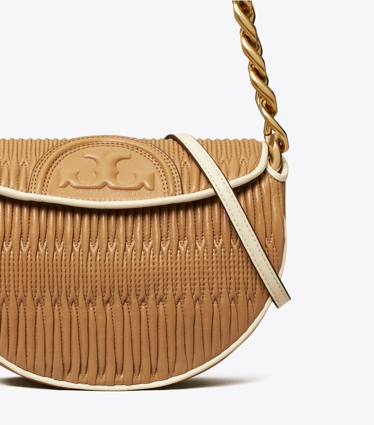 Tory Burch designer shoulder bags Mini Fleming Soft Pleated Crescent Bag in DUSTY ALMOND angle