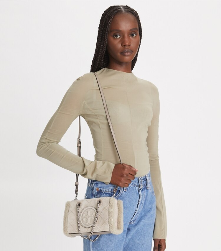 Tory Burch designer crossbody bags Mini Fleming Soft Shearling Chain Tote in Cotton Grey additional on model