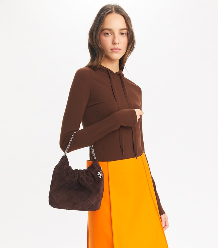 Tory Burch designer crossbody bags Mini Fleming Soft Suede Hobo Bag in Licorice additional on model