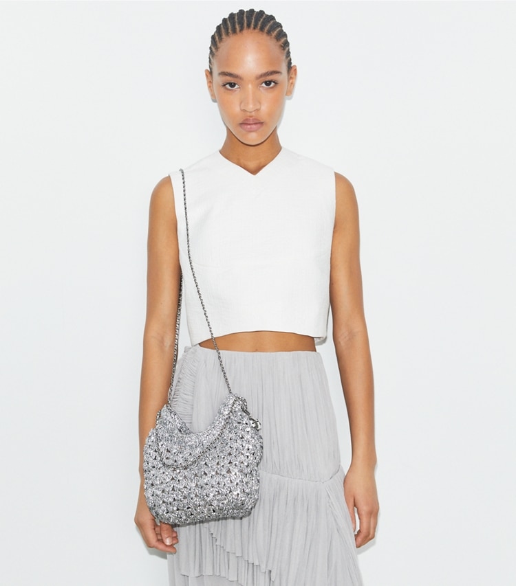Tory Burch designer crossbody bags Mini Fleming Woven Hobo Bag in Silver accessory on model