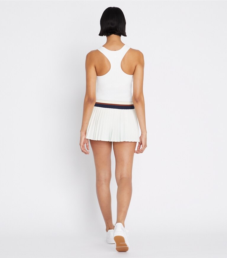 Tory Sport designer bas Mini jupe de tennis plissée in Snow White / Tory Navy front