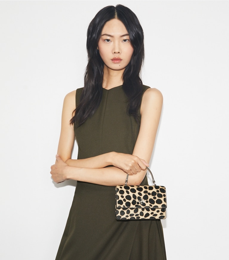 Tory Burch designer mini bags Mini Kira Calf Hair Top-Handle Crossbody in TRENCH / Black angle