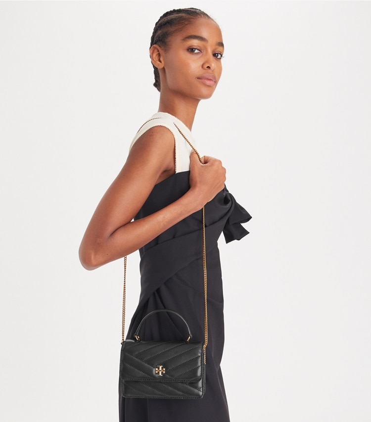 Tory Burch designer mini bags Mini Kira Chevron Top Handle Crossbody in Black accessory on model