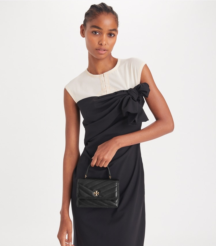 Tory Burch designer mini bags Mini Kira Chevron Top Handle Crossbody in Black additional on model