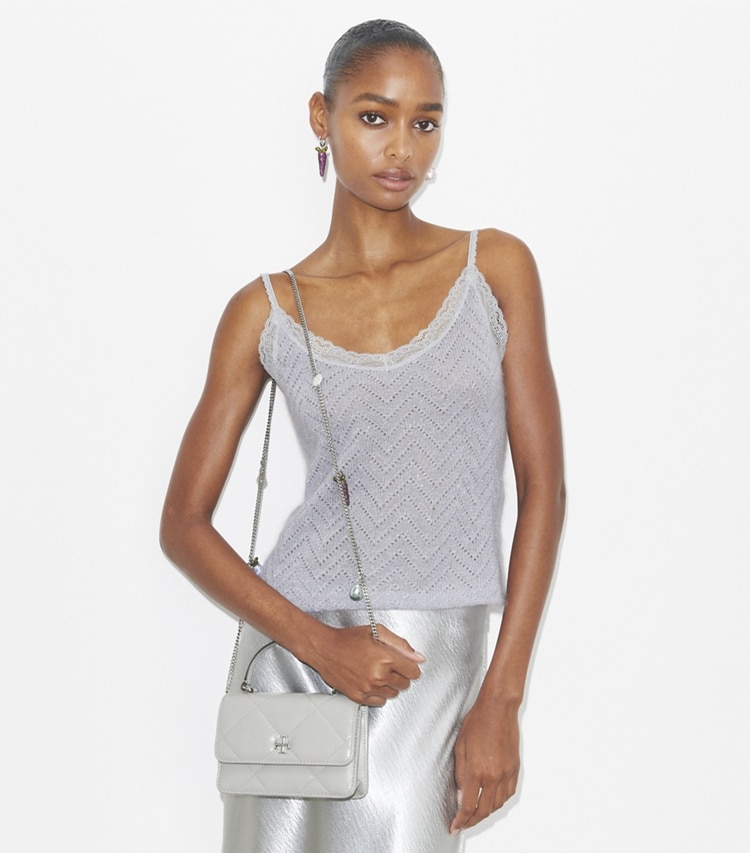 Tory Burch designer mini bags Mini Kira Diamond Quilt Charm Top-Handle Crossbody in Gray accessory on model