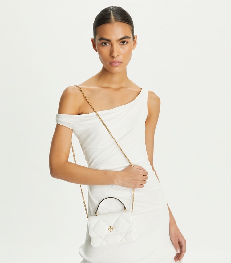 Tory Burch designer mini bags Mini Kira Diamond Quilt Top-Handle Crossbody in Cirrus Cloud accessory on model