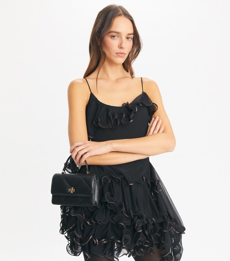 Tory Burch designer mini bags Mini Kira Diamond Quilt Top-Handle Crossbody in Black additional on model