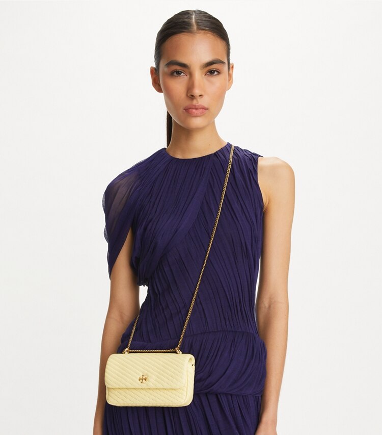 Tory Burch designer クロスボディバッグ キラ モト キルト ミニフラップバッグ in LEMON SWIRL additional on model