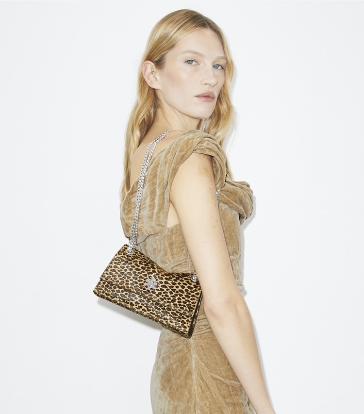 Tory Burch designer shoulder bags Mini Kira Turnlock Calf Hair Shoulder Bag in Multi accessory on model