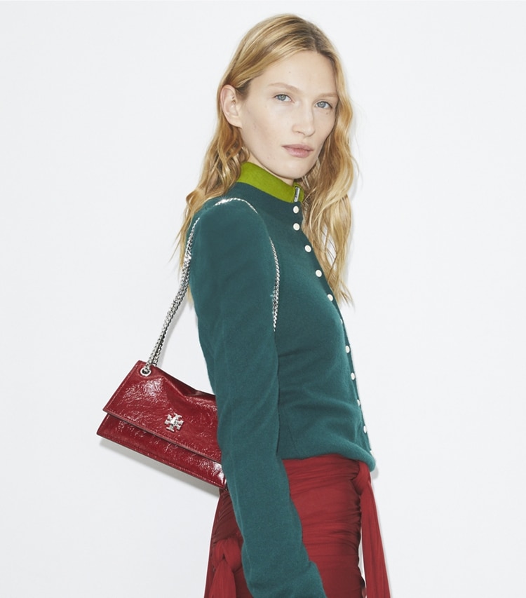 Tory Burch designer shoulder bags Mini Kira Turnlock Shoulder Bag in Red accessory on model