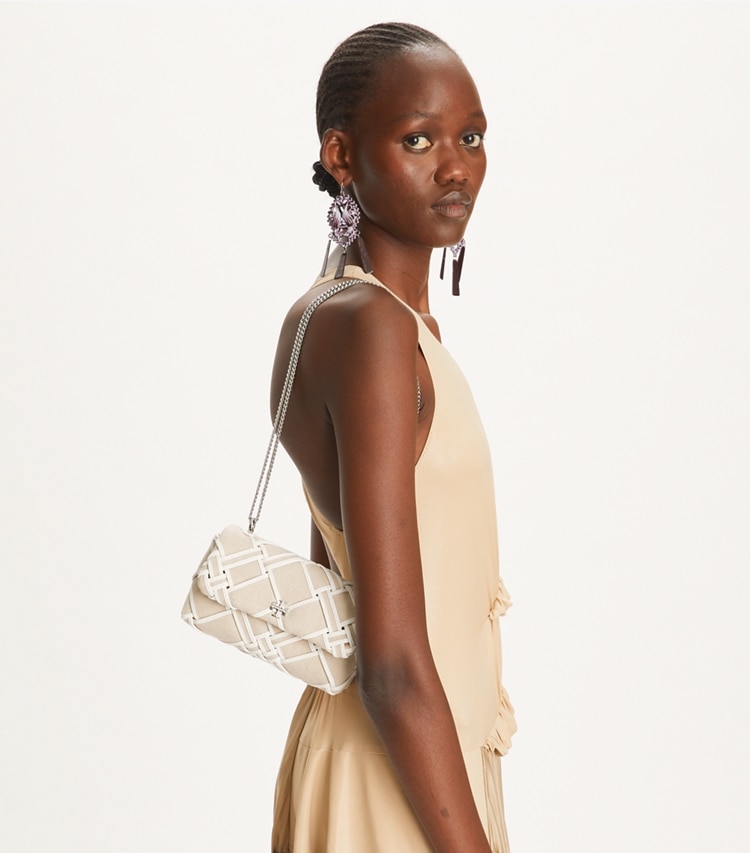 Tory Burch designer crossbody bags Mini Kira Woven Canvas Flap Bag in Natural / Blanc accessory on model
