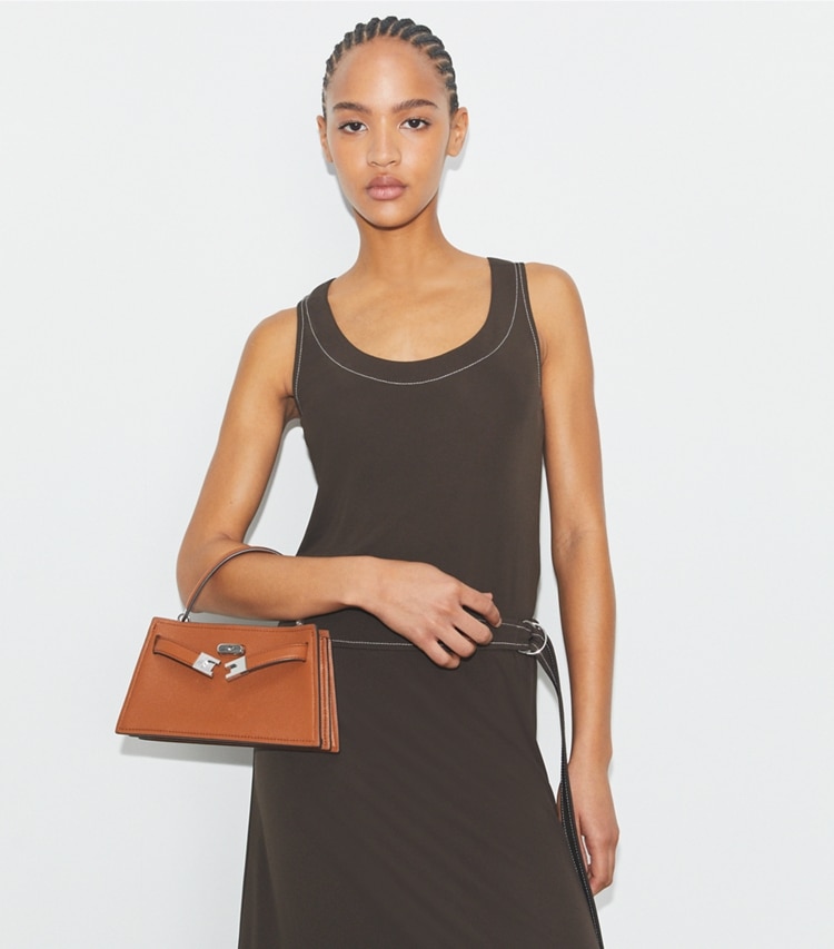 Tory Burch designer mini bags Mini Lee Radziwill Top-Handle Bag in BOURBON accessory on model