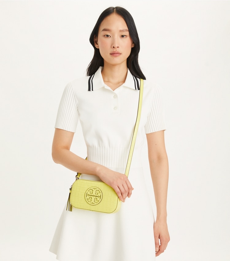 Tory Burch designer crossbody bags Mini Miller Croc-Embossed Crossbody Bag in Lemon Chiffon accessory on model