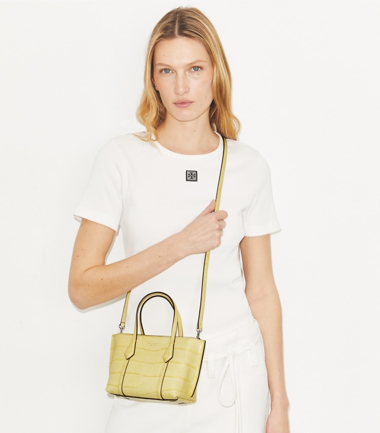 Tory Burch designer crossbody bags Mini Perry Embossed Tote in Yellow Sky accessory on model