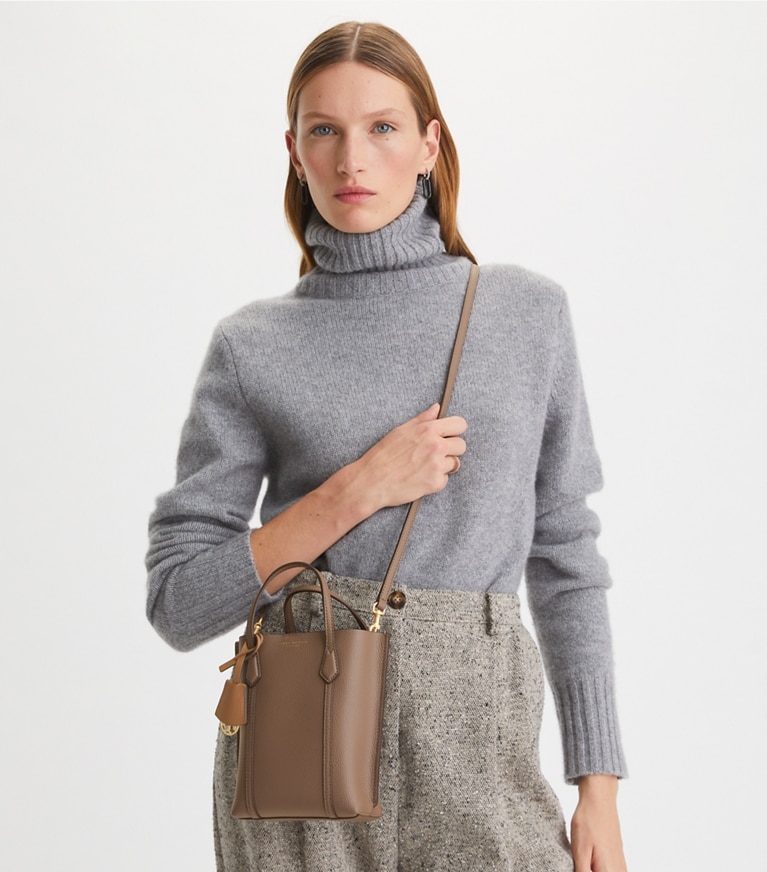 Tory Burch designer crossbody bags Mini Perry Tote in CLAM SHELL accessory on model