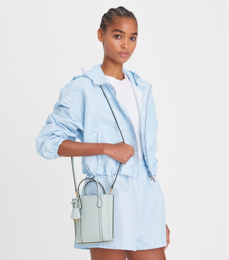 Tory Burch designer crossbody bags Mini Perry Tote in Seltzer / Pavestone accessory on model