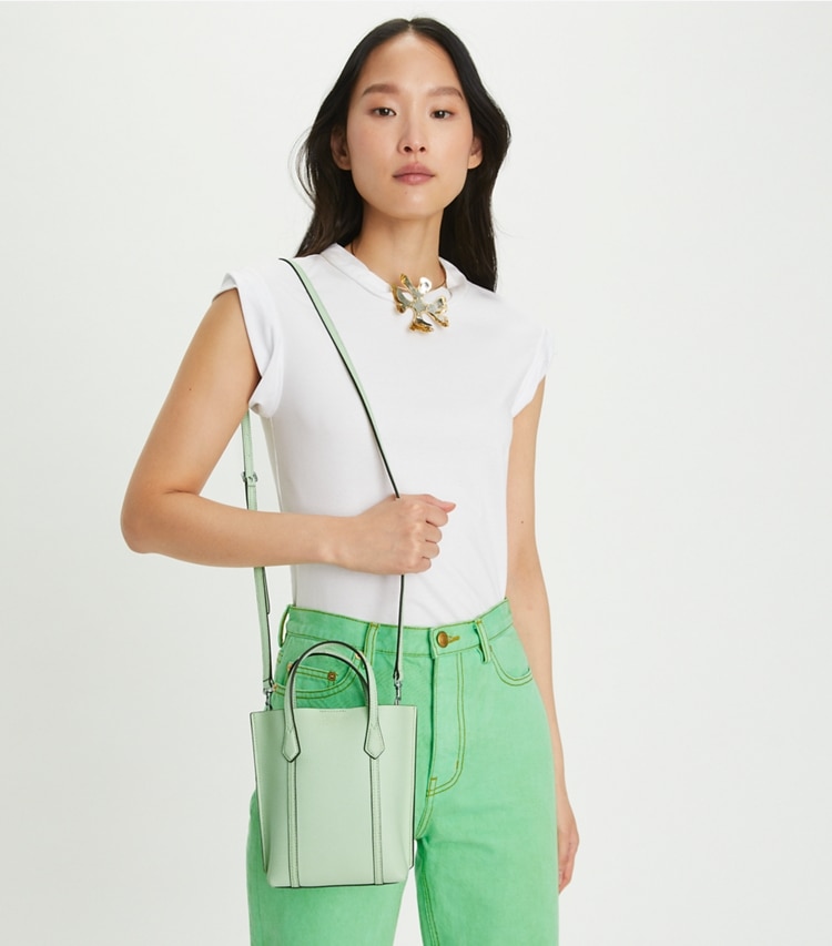 Tory Burch designer crossbody bags Mini Perry Tote in MEADOW MIST accessory on model