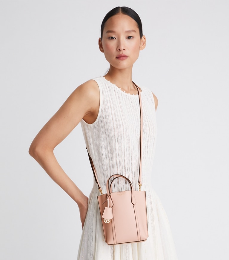 Tory Burch designer crossbody bags Mini Perry Tote in Shell Pink accessory on model