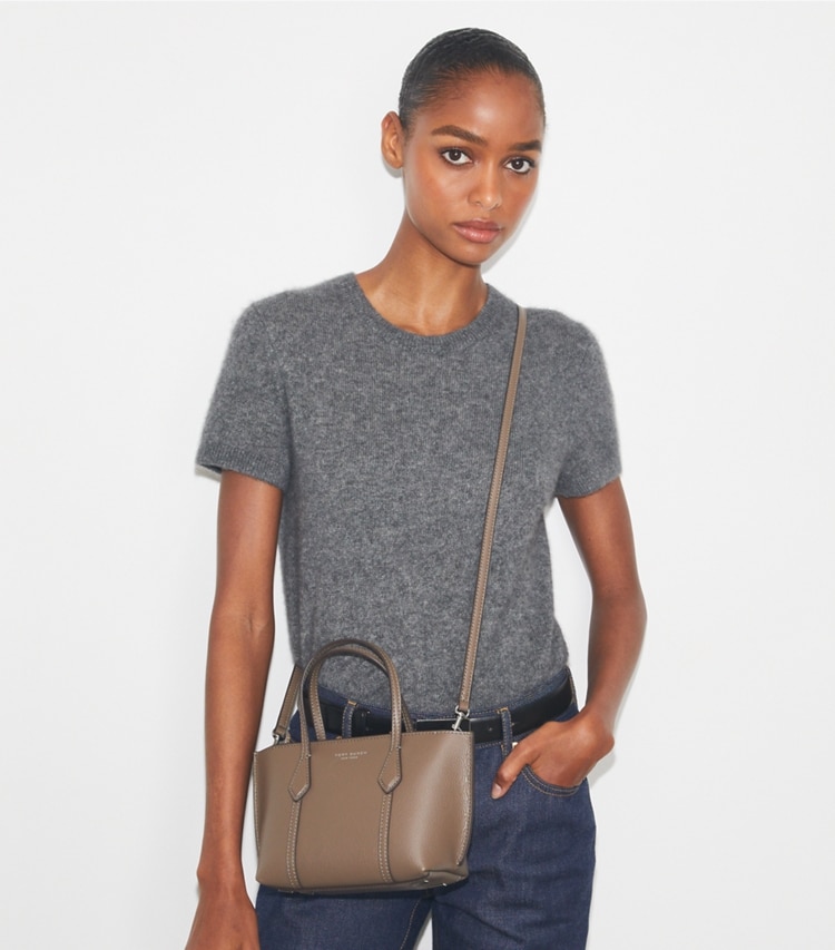 Tory Burch designer crossbody bags Mini Perry Tote in Wild Mushroom accessory on model
