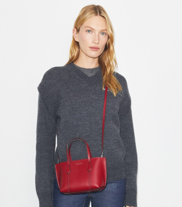 Tory Burch designer crossbody bags Mini Perry Tote in Bartlett Red accessory on model