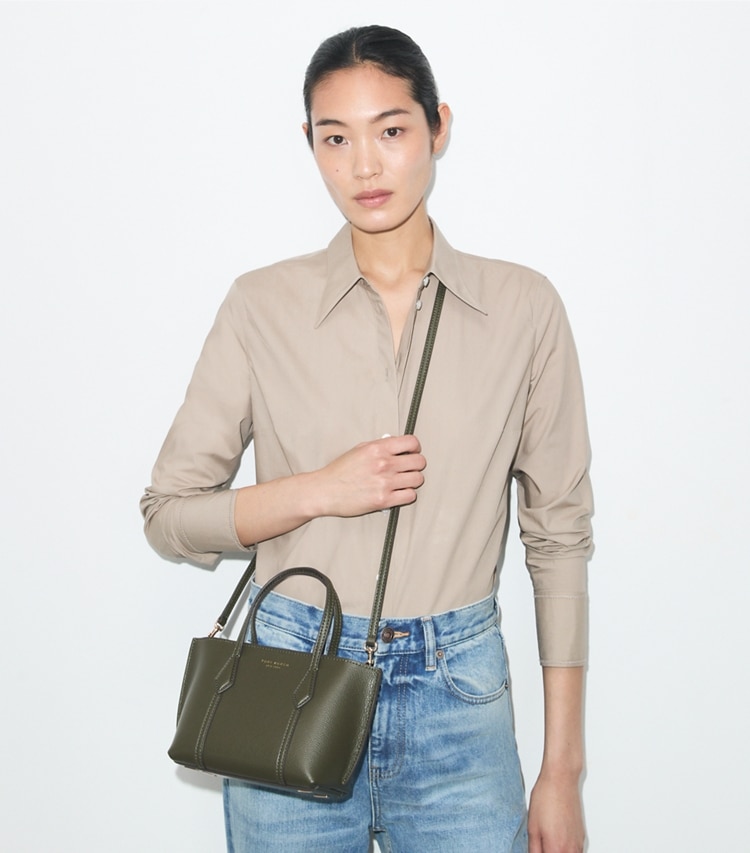 Tory Burch designer crossbody bags Mini Perry Tote in Dark Olive accessory on model