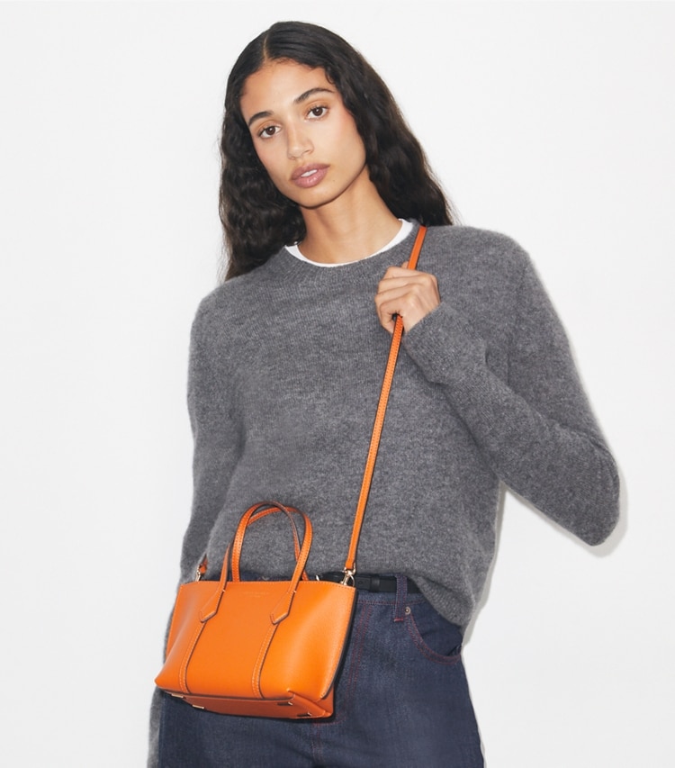 Tory Burch designer crossbody bags Mini Perry Tote in Orange Jam accessory on model