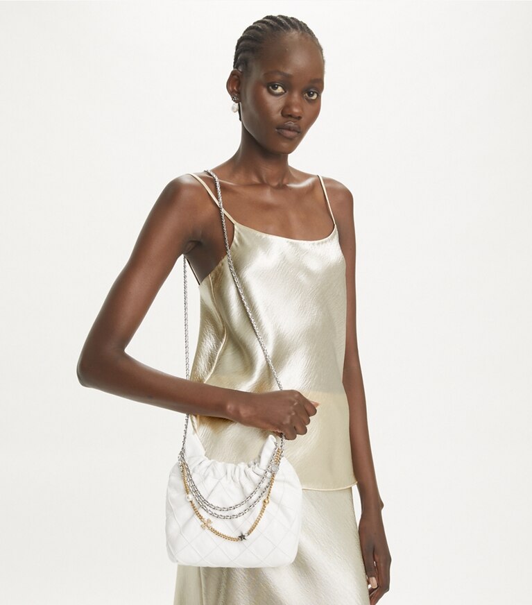 Tory Burch designer sacs à bandoulière Mini sac à cordon de serrage Fleming en cuir souple craquelé in Blanc angle