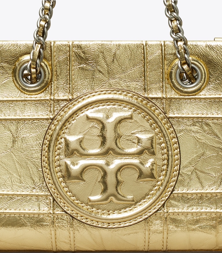 Tory Burch designer borse a spalla Mini shopping Fleming morbida con catena in 18 Kt Gold dettaglio