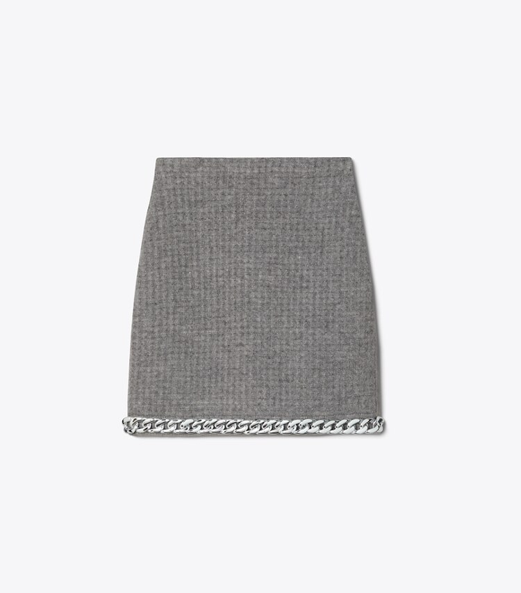 Tory Burch designer bas Minijupe à ornement chaîne in Mineral Gray front