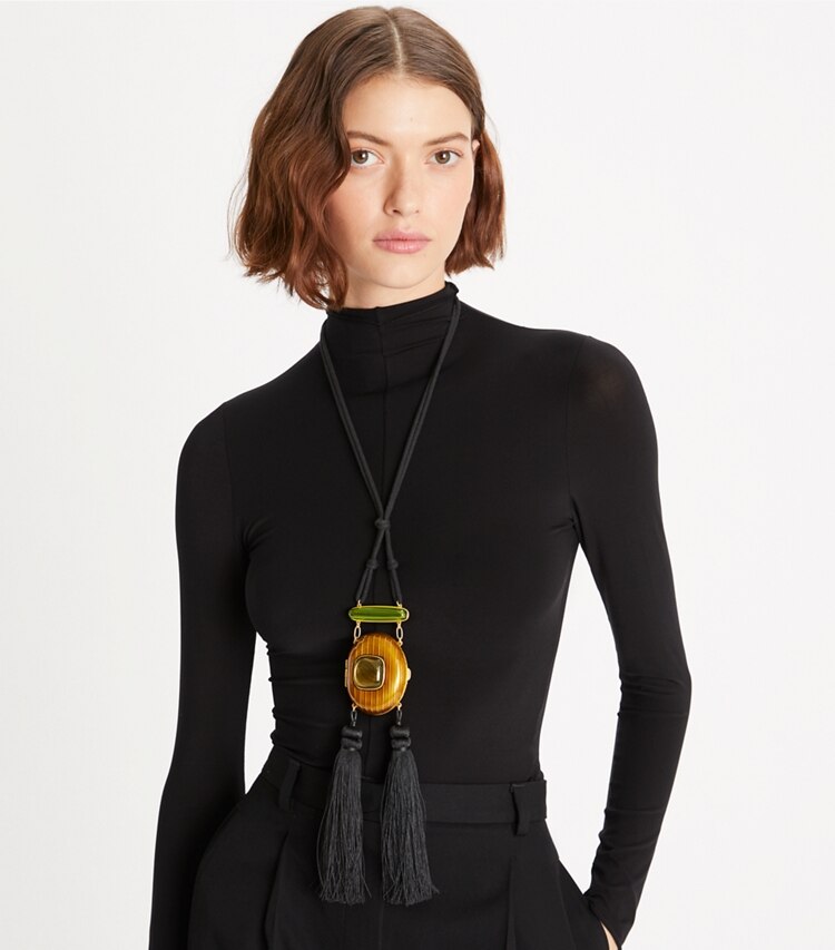 Tory Burch designer necklaces Mirror Locket Pendant Necklace  in Rolled Gold/Brown Multi accessory on model