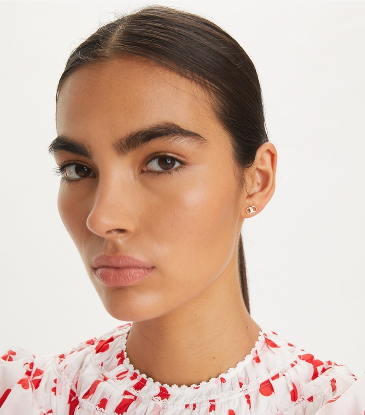 Tory Burch designer earrings Mismatched Stud Set in Tory Gold / Crystal / Pearl accessory on model