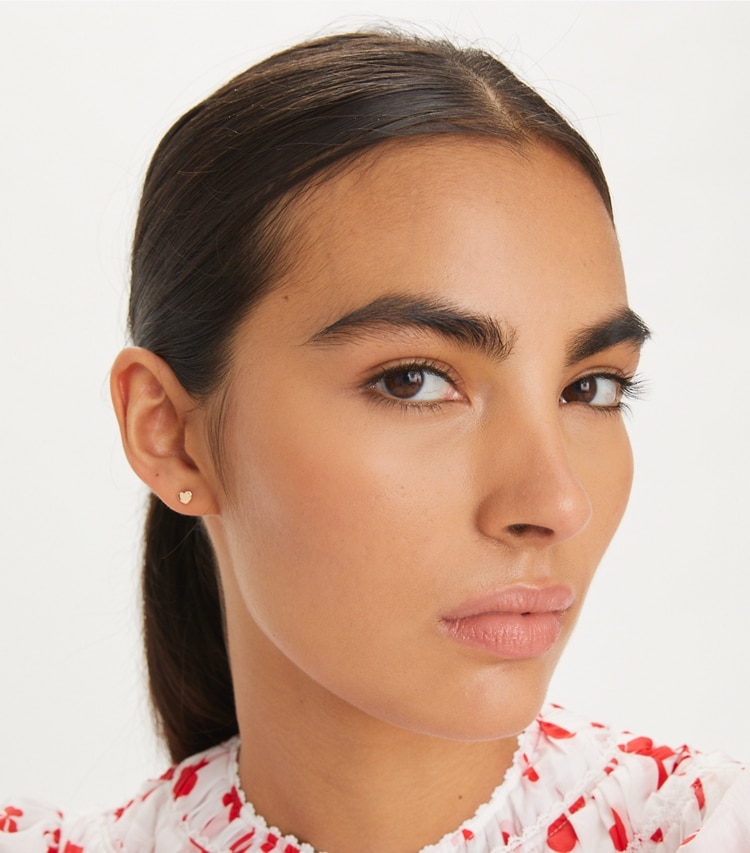 Tory Burch designer earrings Mismatched Stud Set in Tory Gold / Crystal / Pearl additional on model