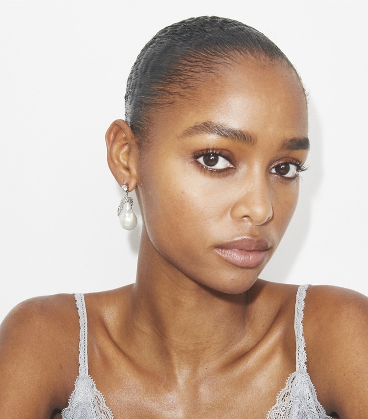 Tory Burch designer earrings Moondance Crystal and Pearl Drop Earrings in Ivory / Crystal accessory on model