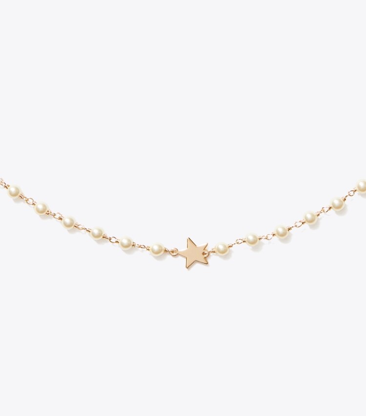 Tory Burch designer necklaces Moondance Delicate Pearl Star Necklace in Tory Gold / Cream detail