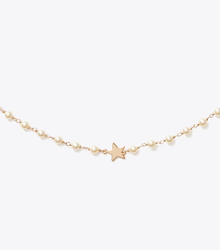 Tory Burch designer necklaces Moondance Delicate Pearl Star Necklace in Tory Gold / Cream detail