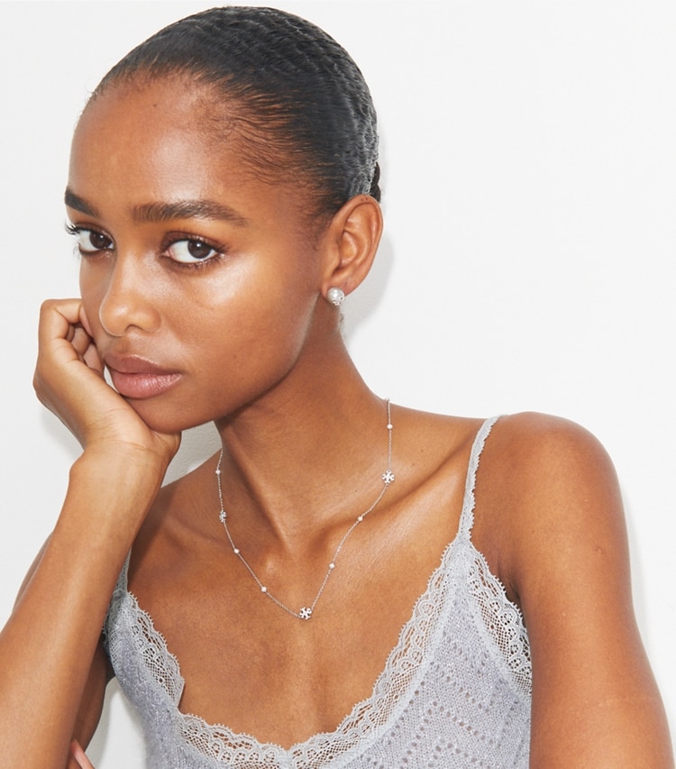 Tory Burch designer earrings Moondance Pearl and Pavé Stud Earrings in Gray accessory on model