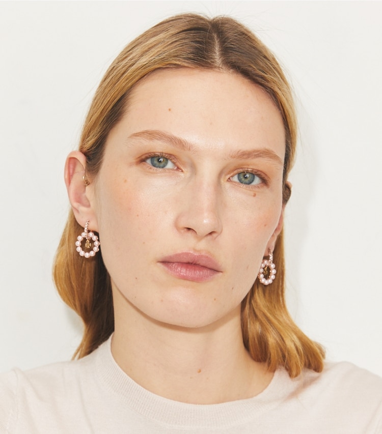 Tory Burch designer earrings Moondance Pearl Hoop Earrings in Pink accessory on model