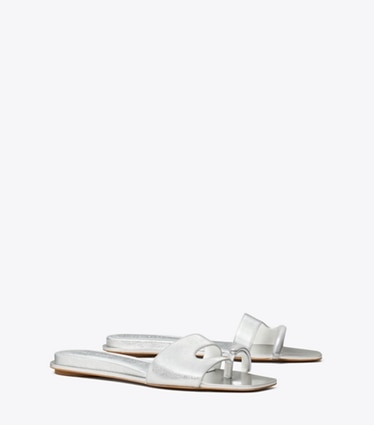 Tory Burch designer sandales Mules effet piercing in BRIGHT SILVER / SILVER angle