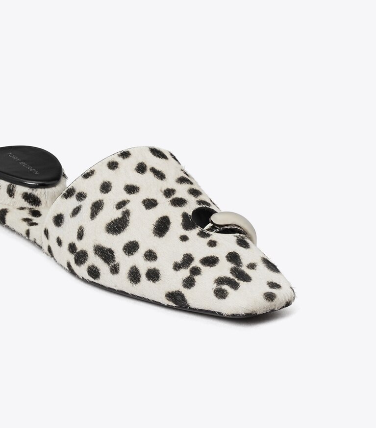 Tory Burch designer mocassins Mules effet piercing in Black / White informations