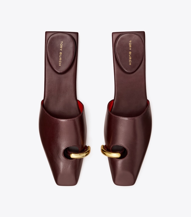 Tory Burch designer mocassins Mules effet piercing in PLUM / GOLD angle