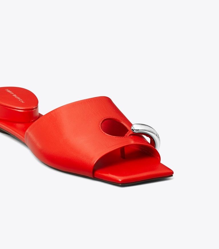 Tory Burch designer sandales Mules plates effet piercing in PAPAVERO angle