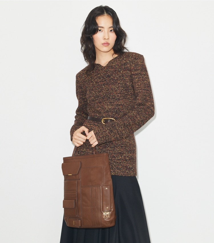 Tory Burch designer tote bags Multi-Pocket Tote in Swiss Coffee accessory on model