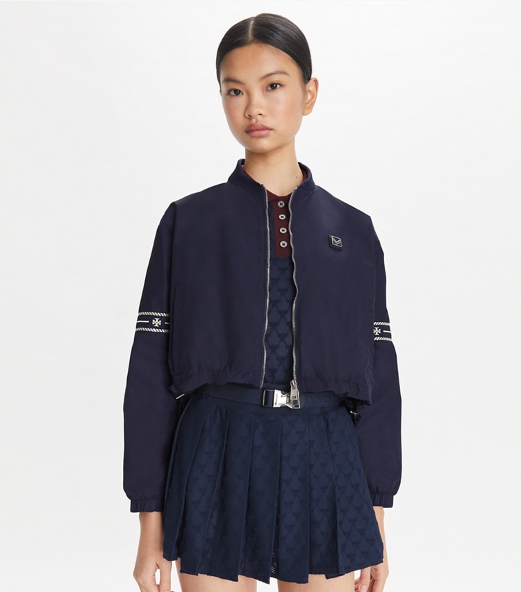 Tory Sport designer jackets Nylon Bomber Jacket in Deep Navy on model detail