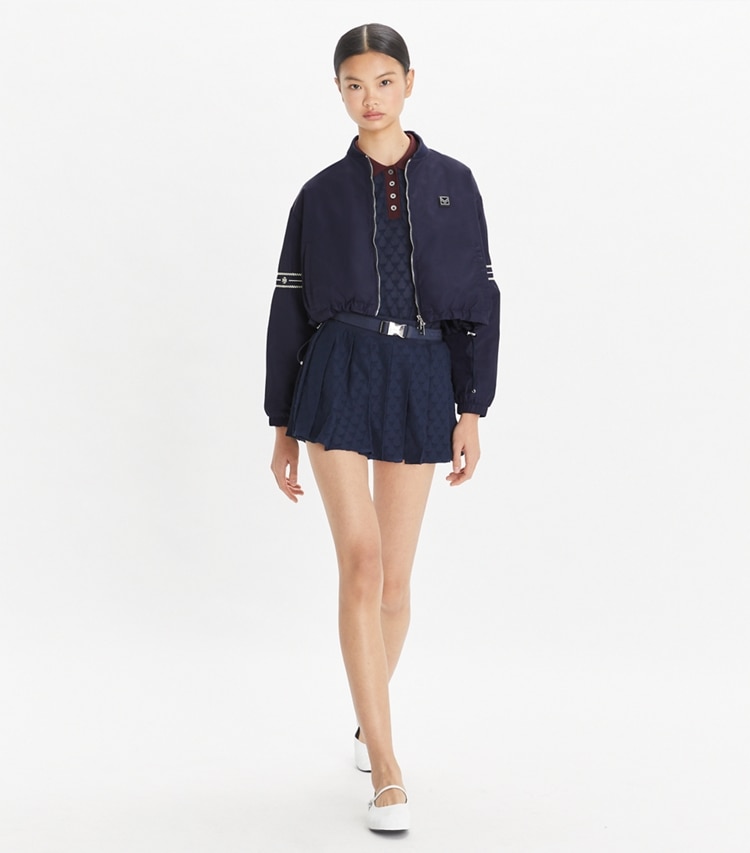 Tory Sport designer jackets Nylon Bomber Jacket in Deep Navy on model front