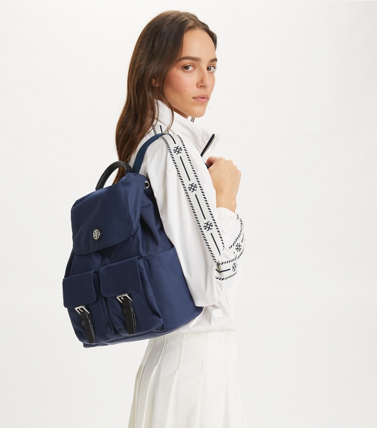 Tory Burch designer backpacks Nylon Flap Backpack in Royal Navy accessory on model