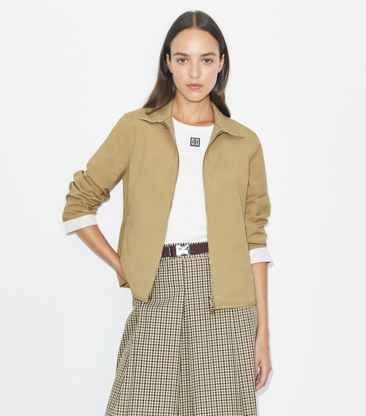 Tory Burch designer jackets Nylon Golf Jacket in Taupe Gray on model detail