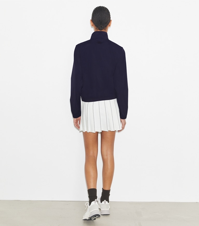 Tory Burch designer jackets Nylon Half-Zip Golf Jacket in Deep Navy front
